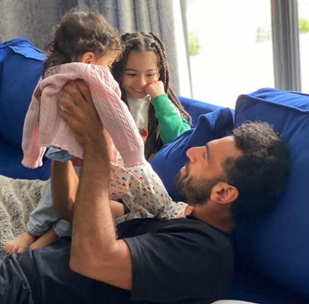 Salah Ghaly’s son, Mohamed Salah, with two granddaughters.
